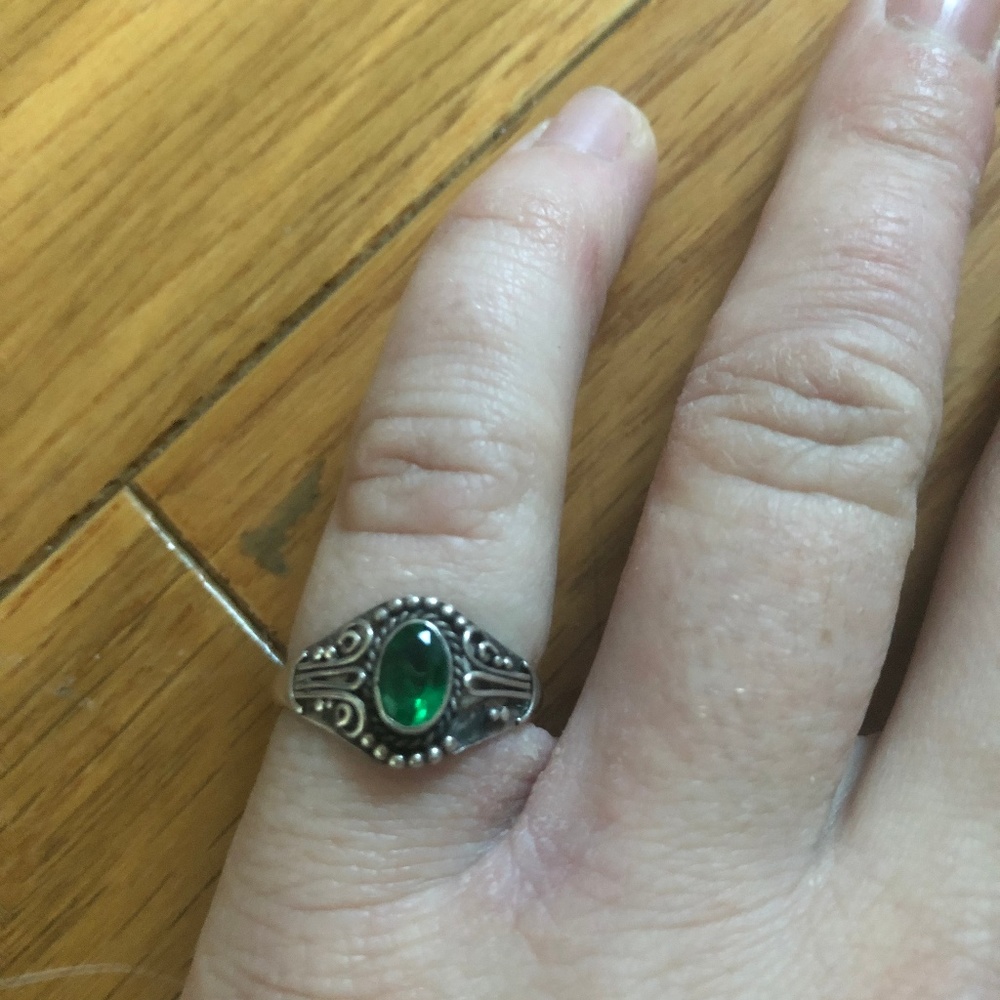 Small green ring.